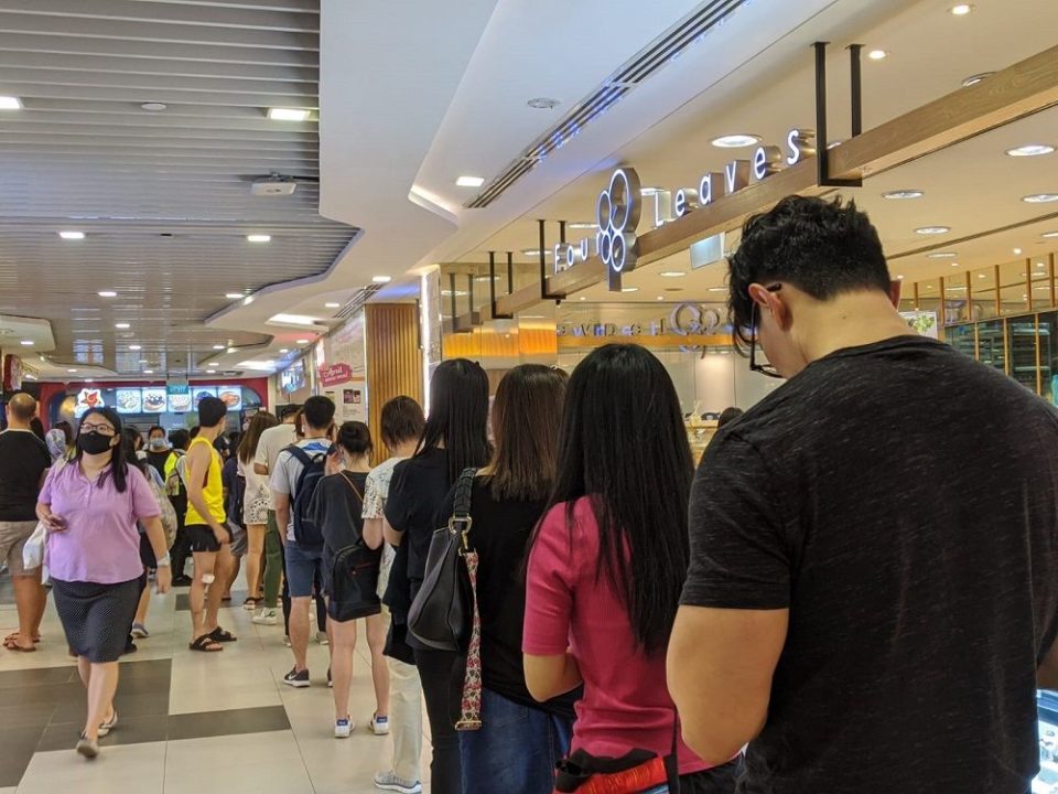 Long queues at some malls as shoppers rush to prepare for closure of schools and most workplaces