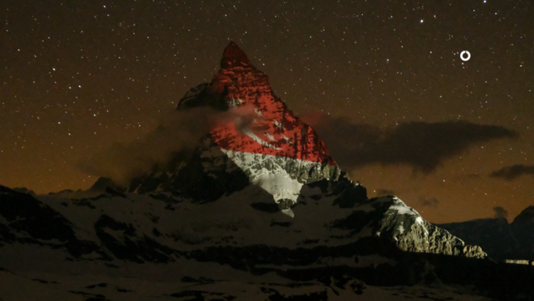 Singapore's flag projected on the Swiss Alps Matterhorn in solidarity