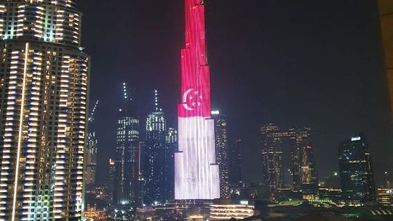 The national flag of Singapore light up in Burj Khalifa