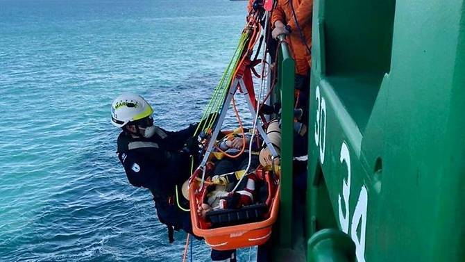SCDF responders rescue injured marine worker from container vessel