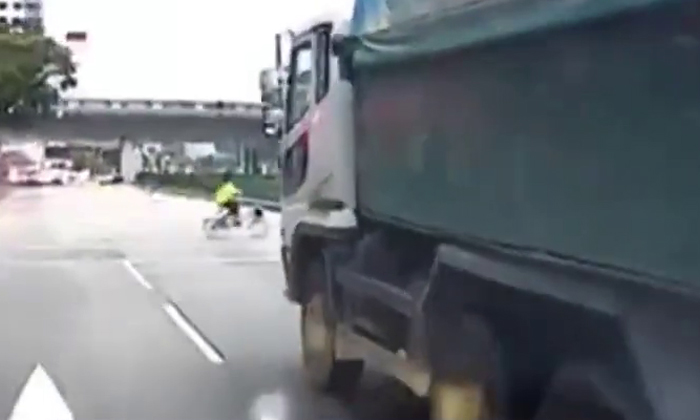 Truck driver beats red light