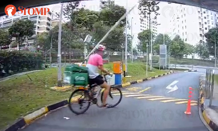 Food delivery rider nearly hit by carpark gantry arm in Yishun