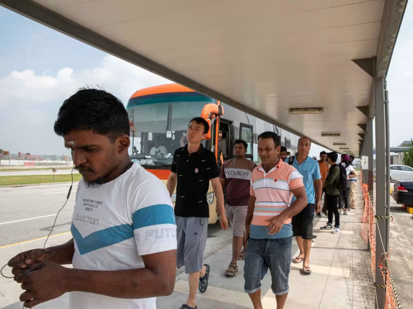 Migrant workers at Tanah Merah dorm have to wait hours for shuttle bus